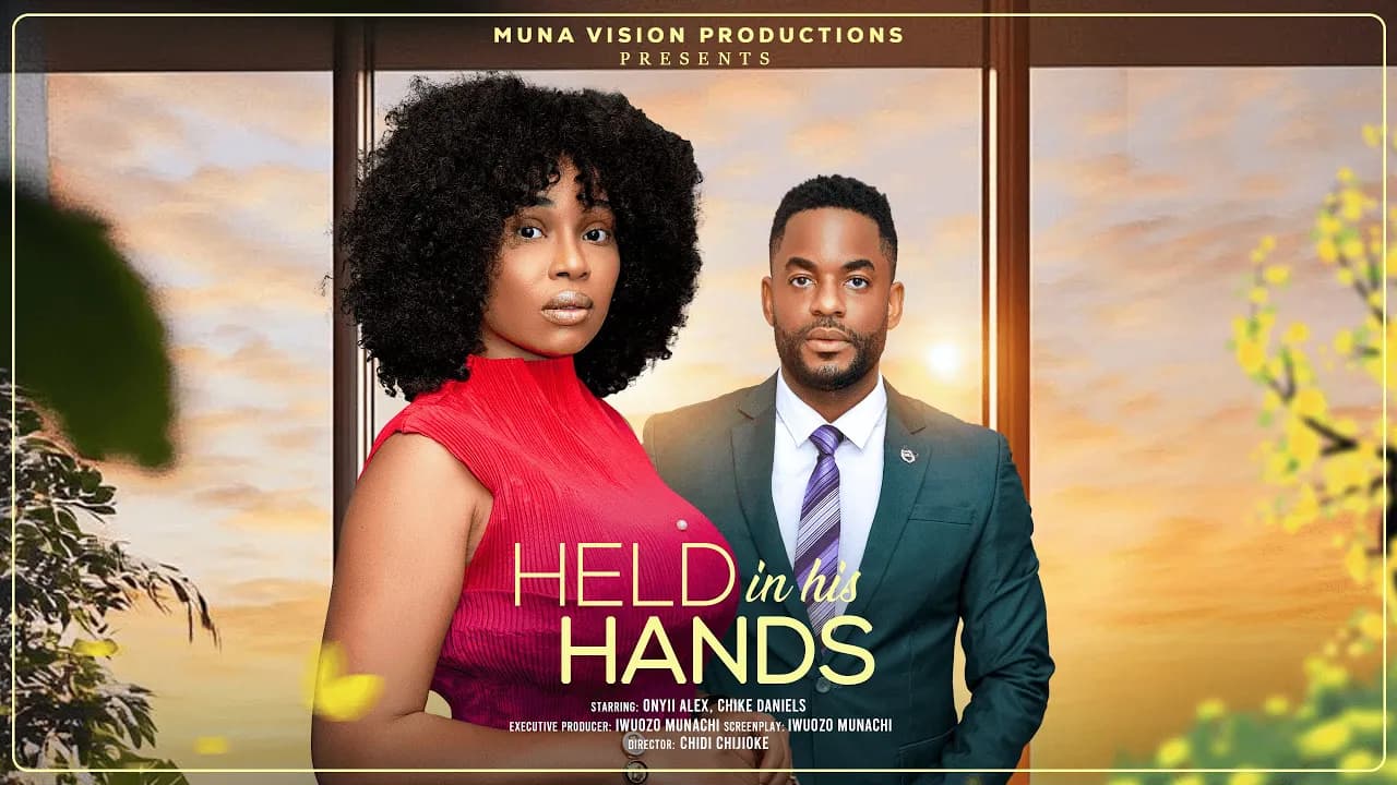 HELD IN HIS HANDS